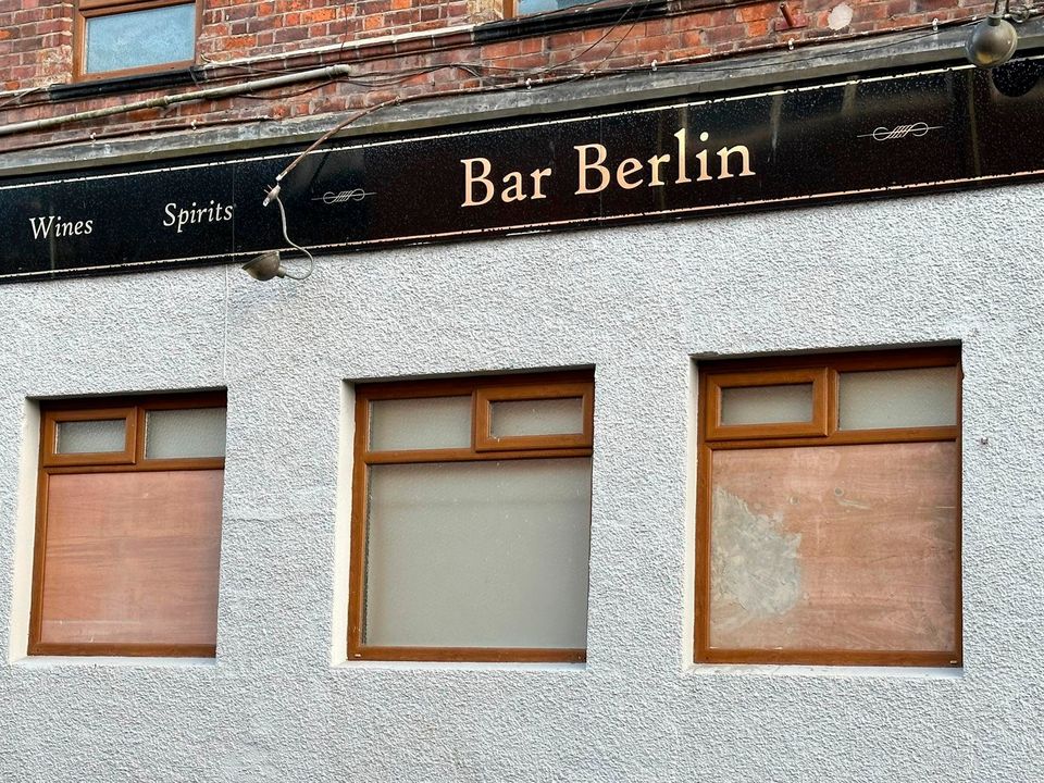 Thugs broke windows and TVs in a Friday night rampage at Bar Berlin on the Shankill