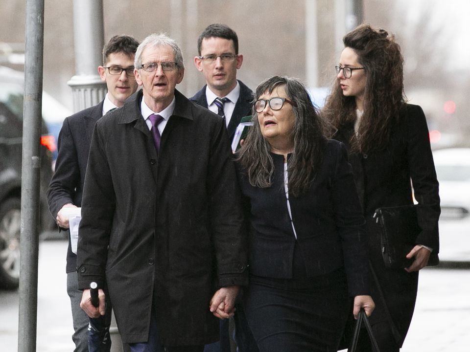 Enoch Burke (centre, back) with his parents (front),  Sean and Martina Burke. Photo: Collins Courts