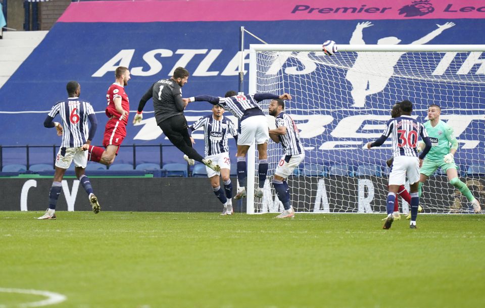 Goalkeeper Alisson Becker scored a crucial goal at West Brom last season (Tim Keeton/PA)