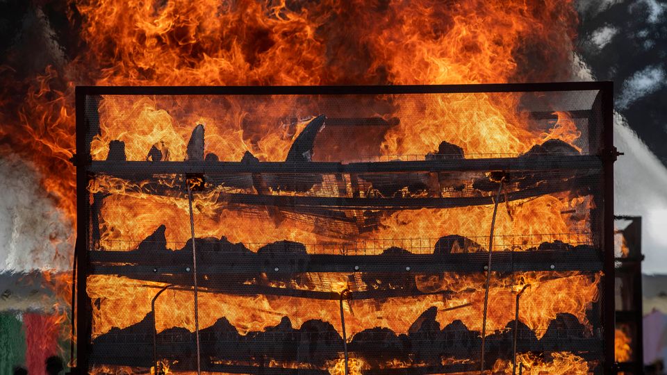 Thousands of confiscated rhino horns are burned to mark World Rhino Day in Bokakhat near Kaziranga National Park, India (AP Photo/Anupam Nath)