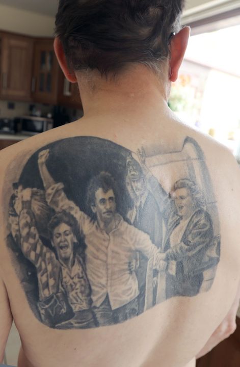 Patrick McMahon has the day he was released from jail emblazoned across his back.