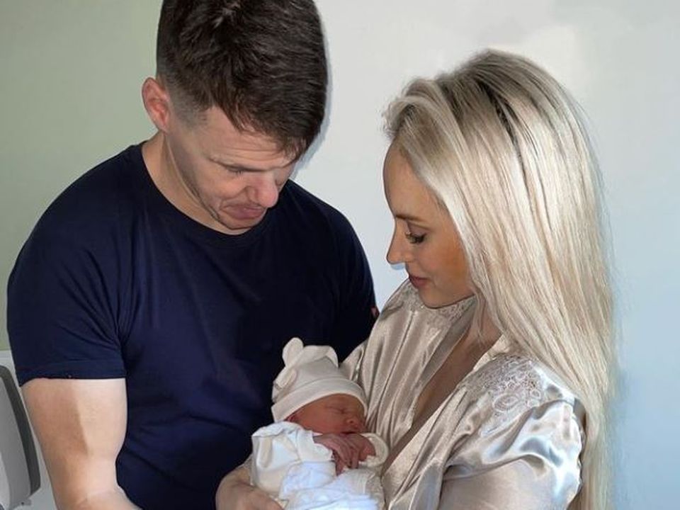 TJ Reid, wife Niamh De Brun and baby Harper. / Instagram @niamhdebrun