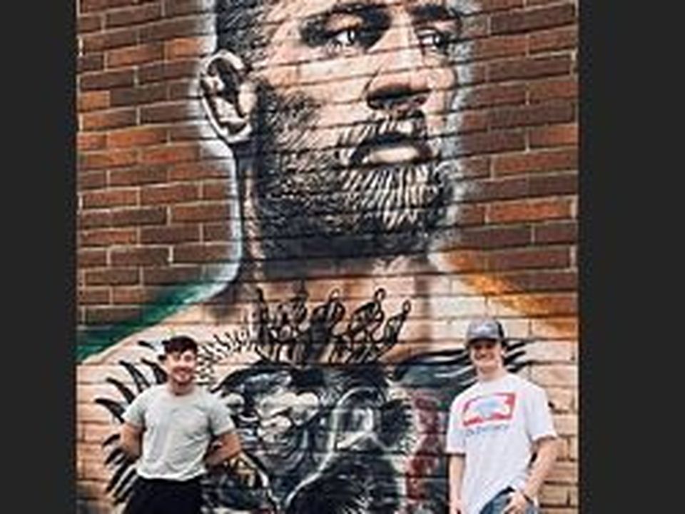 Barry with  Lochlann at the Conor McGregor mural