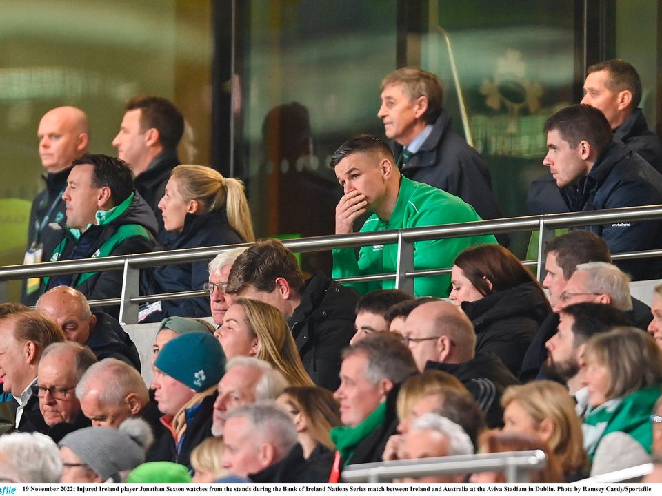 An injured Jonathan Sexton watches from the stands during Ireland's match against Australia at the Aviva Stadium in Dublin. Photo by Ramsey Cardy/Sportsfile