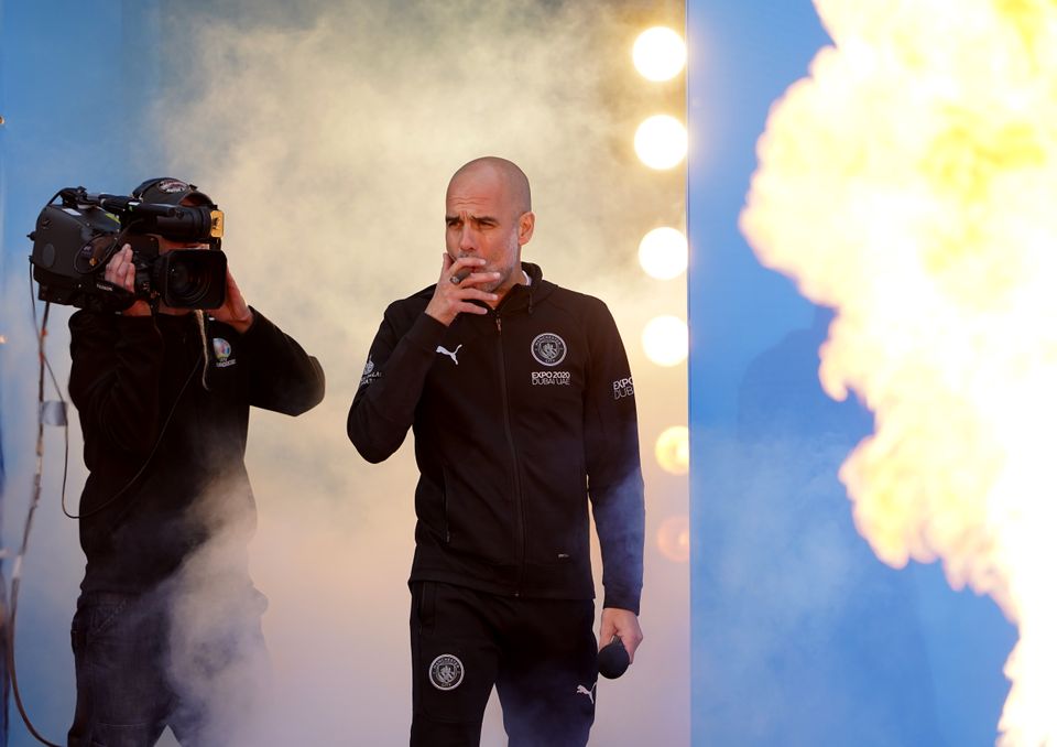 Manchester City manager Pep Guardiola with a cigar (Zac Goodwin/PA)