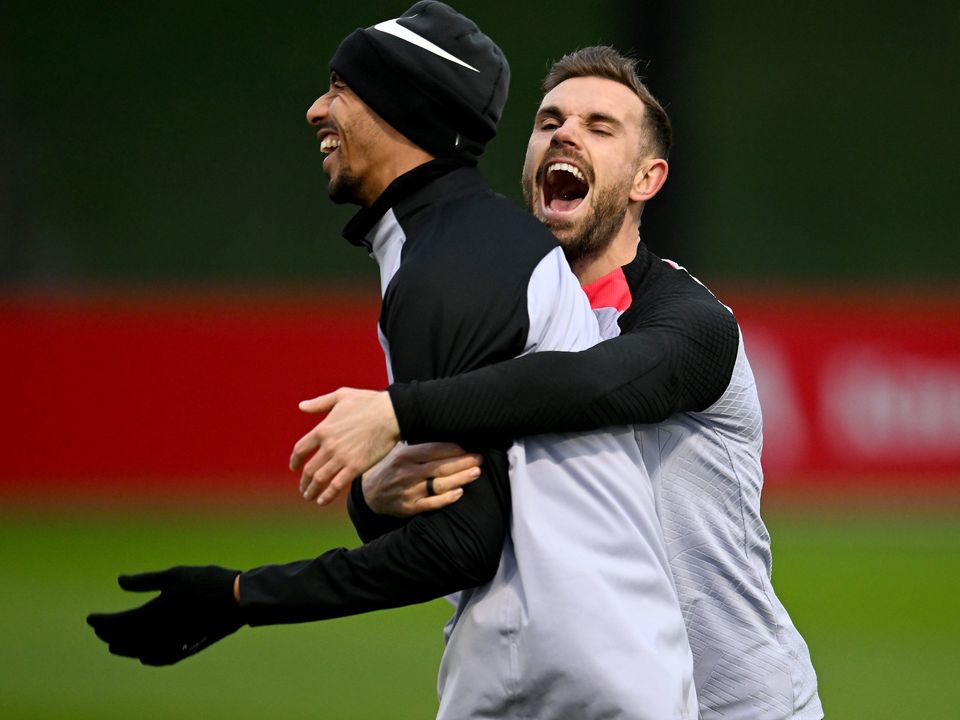 Liverpool's Joel Matip and Jordan Henderson during a training session ahead of their Champions League round of 16 match against Real Madrid at Anfield. Photo: Andrew Powell/Getty Images