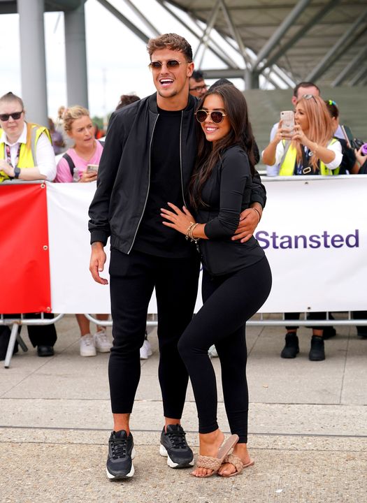 Love Island contestants Luca Bish and Gemma Owen arrive at Stansted Airport in Essex. Picture date: Wednesday August 3, 2022.