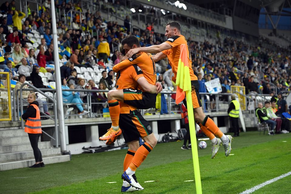 Nathan Collins was joined in celebration by his team-mate after scoring his goal (Rafal Oleksiewicz/PA)