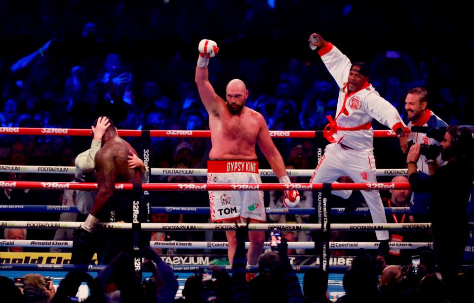 Tyson Fury celebrates winning his fight against Dillian Whyte. Action Images via Reuters/Peter Cziborra