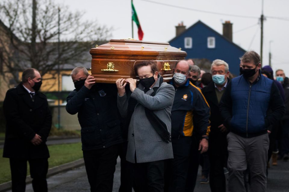 Marty Morrissey and mourners at the funeral