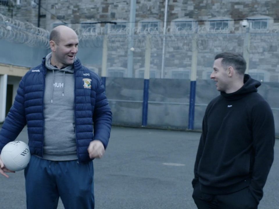Comedian Rory O’Connor and All-Ireland star Philly McMahon in Mountjoy Prison to train and motivate the players ahead of their match against the wardens