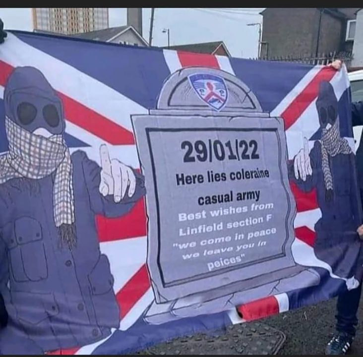 Linfield fans with a flag which they made for the Irish League Cup Final