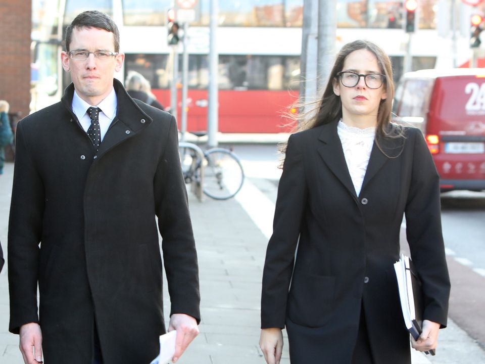 Enoch Burke leaving  the High Court with his sister Ammi at a previous hearing. Photo: Collins