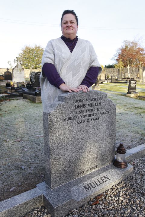 Denise Mullen at her fathers grave.
