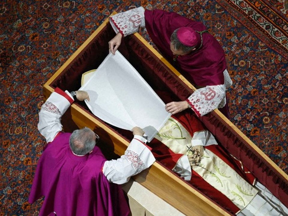 The body of former Pope Benedict XVI lies in St Peter's Basilica ahead of the funeral. Photo: Reuters