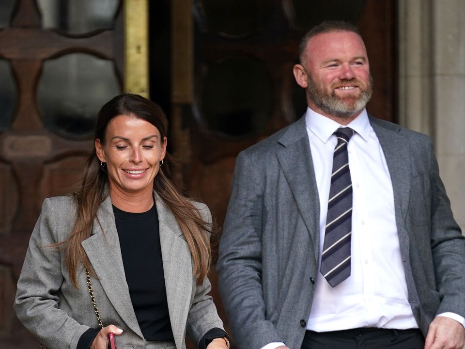Coleen and Wayne Rooney leaving the Royal Courts Of Justice, London on Monday
