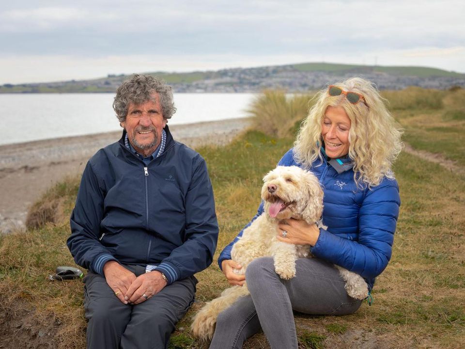 Charlie Bird with his wife Claire and their dog Tiger. Photo: Owen Breslin.