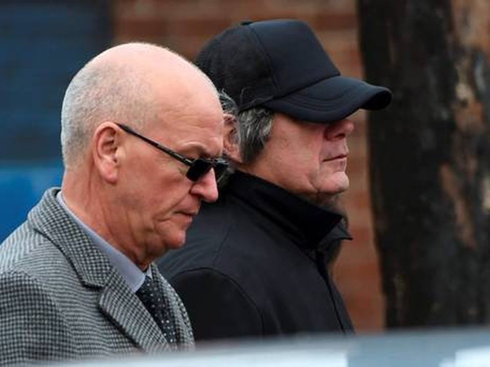 Gerry Hutch (right) at a family funeral during the gang war