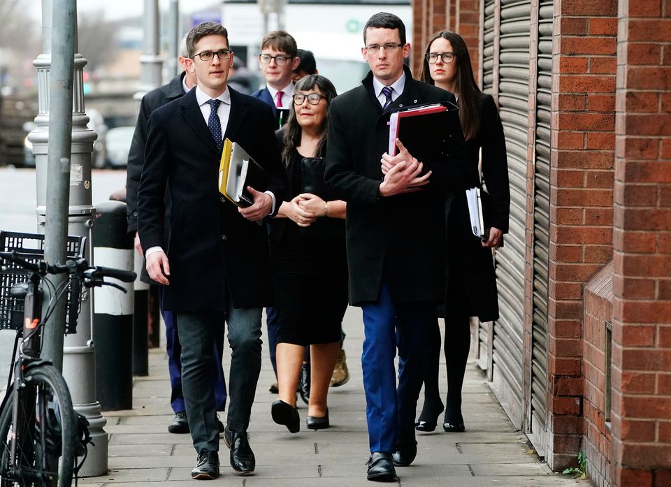 Enoch Burke arrives in court supported by family members