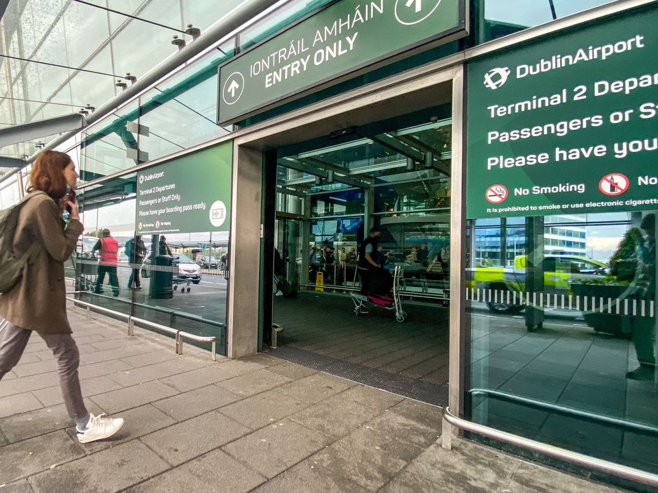 Passengers arrive at Dublin airport on Friday morning as around 200,000 people are set to travel through the airport over the bank holiday weekend (Damien Storan/PA)