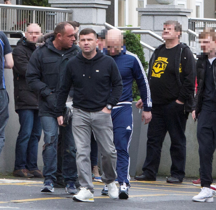 Byrne leaves the Regency Hotel after the shooting of his brother David