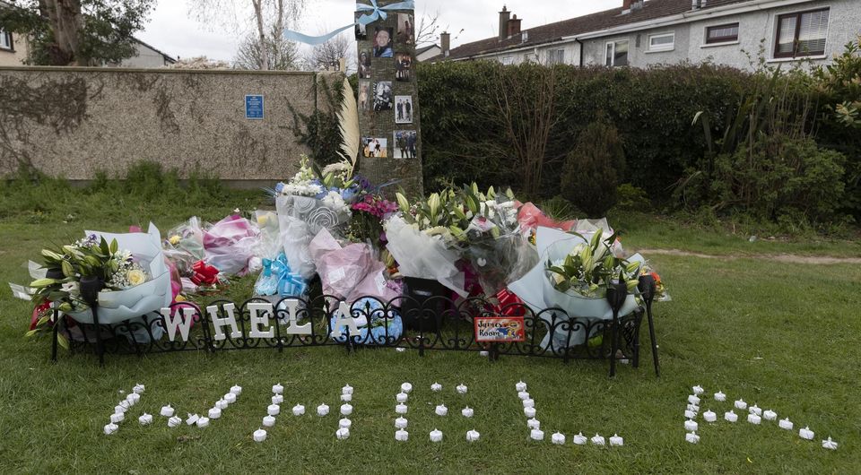 Flowers and tributes at the scene of the fatal shooting of James Whelan in Deanstown Avenue in Finglas, Dublin last week. Picture by Colin Keegan