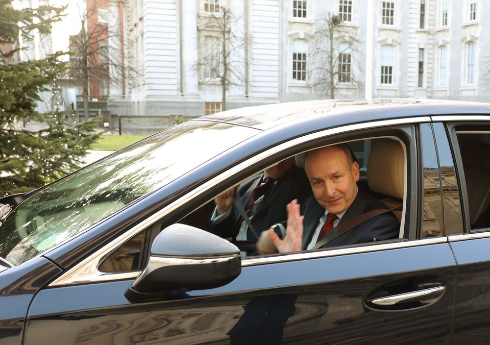 Taoiseach Micheál Martin pictured leaving Government Buildings before travelling to Áras an Uachtarain to tender his resignation to President Michael D.Higgins.