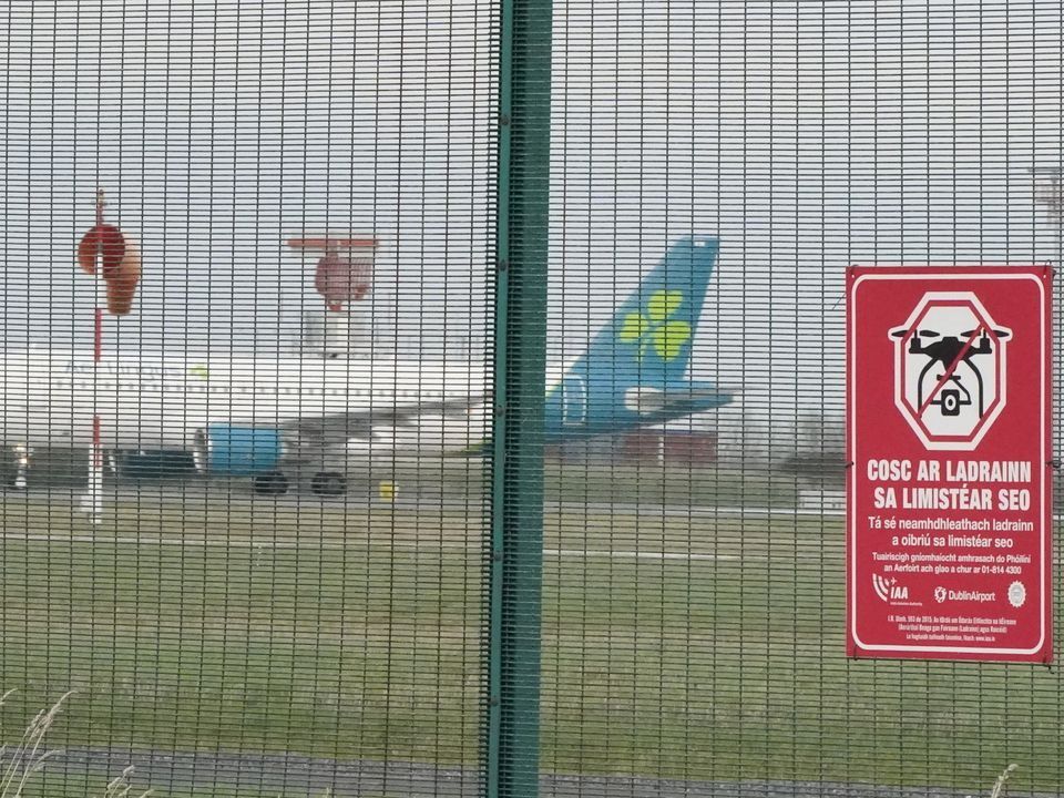 Anti-drone warning sign on the perimeter fence at Dublin Airport.
