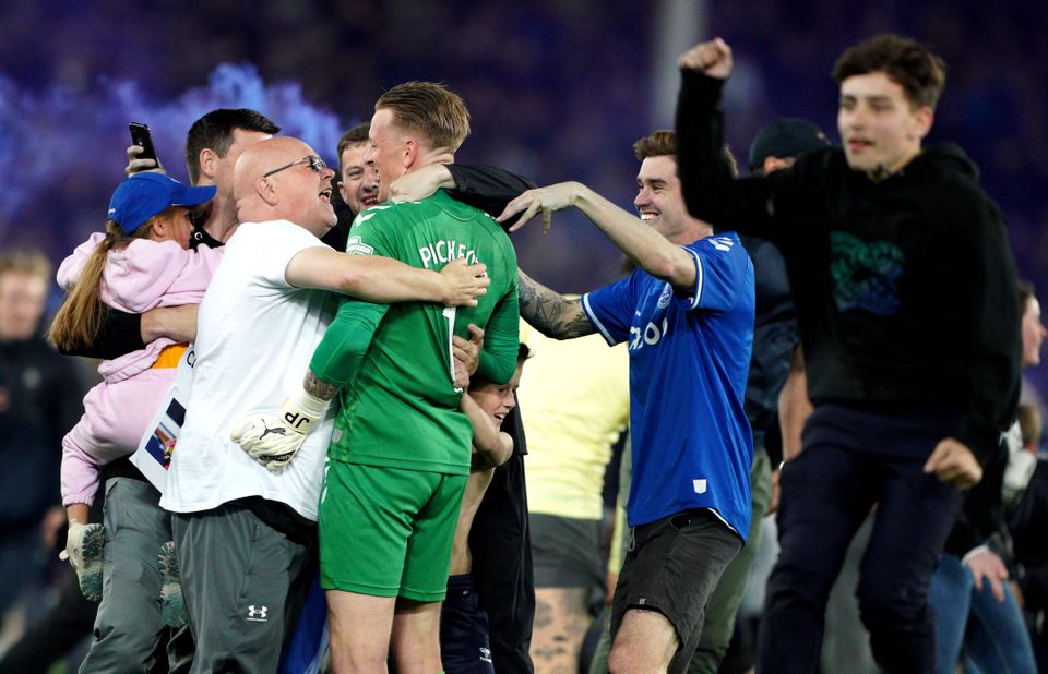 Fans ran onto the pitch after Dominic Calvert-Lewin’s winner (Peter Byrne/PA)