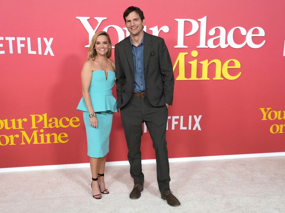 Reese Witherspoon, left, and Ashton Kutcher arrive at the world premiere of 'Your Place Or Mine' Photo: Jordan Strauss/Invision/AP