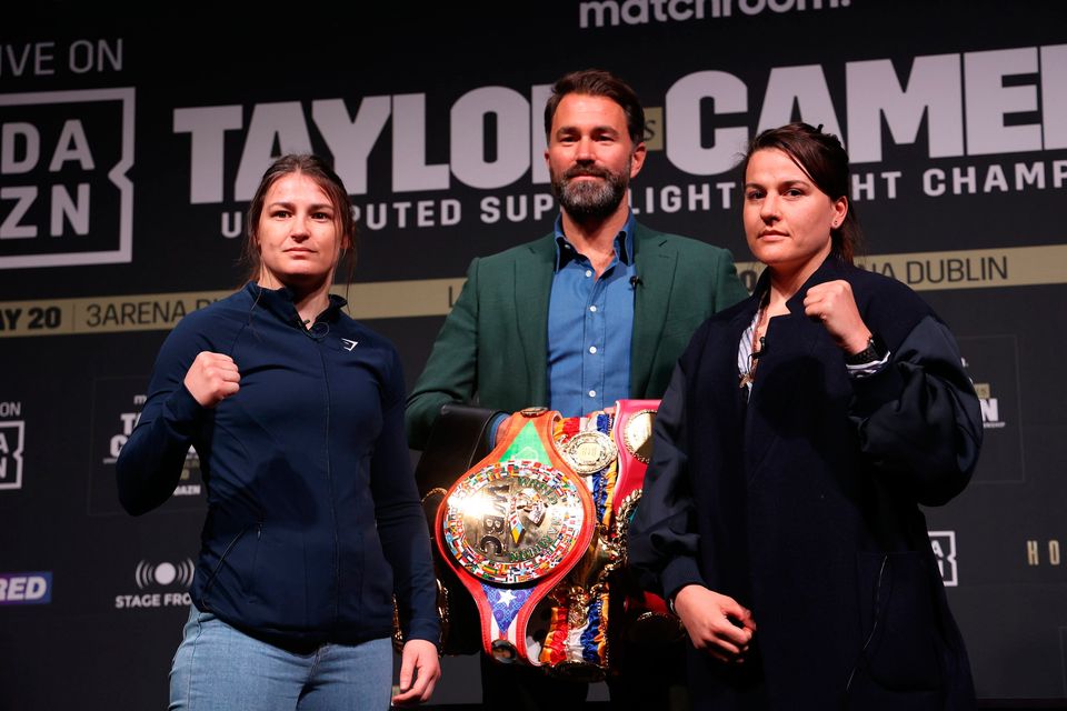 Katie Taylor (left) with Chantelle Cameron as Promoter, Eddie Hearn looks on during a press conference at The Mansion House, Dublin. Picture: Damien Eagers/PA Wire.