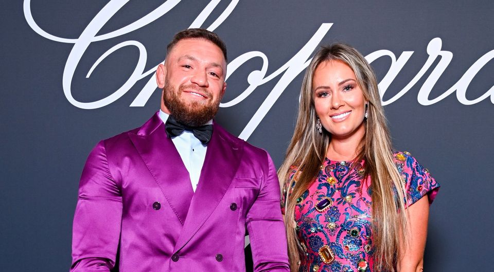 Pictures: Conor McGregor in the best of spirits while attending