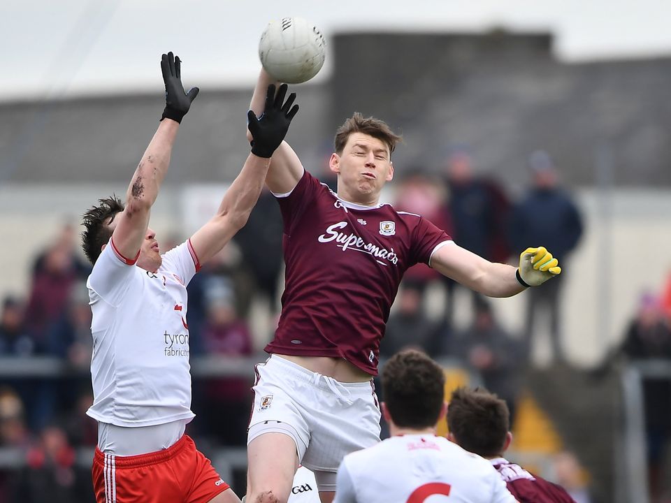 Tom Flynn of Galway in action against Colm Cavanagh of Tyrone.  Photo: David Fitzgerald/Sportsfile