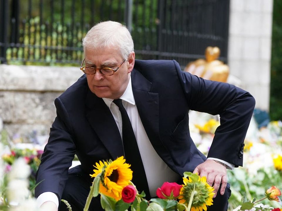 Britain's Prince Andrew reads tributes