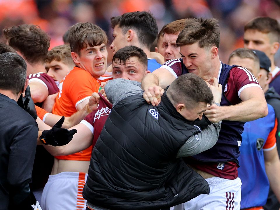 Galway's Damien Comer clashes with a member of the Armagh panel