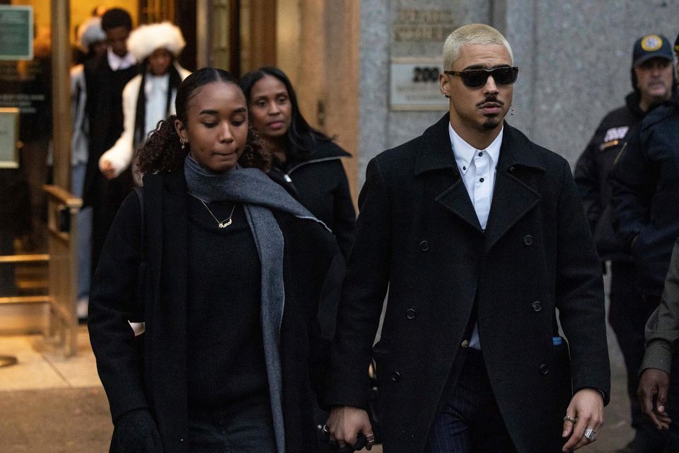 Chance Combs, left, daughter, and Quincy Brown, right, stepson of Sean “Diddy” Combs leave Manhattan federal court (Yuki Iwamura/AP)