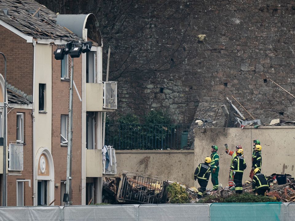 Specialist rescue teams at the scene of an explosion and fire at a block of flats in St Helier, Jersey. At least five people have died Picture date: Sunday December 11, 2022.