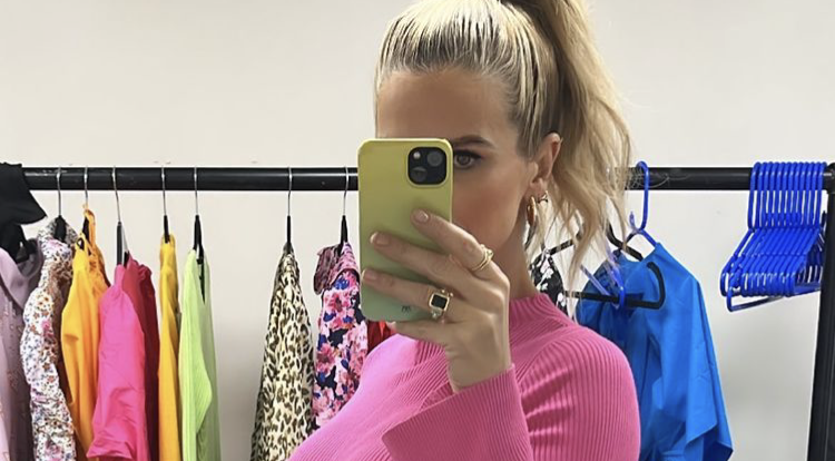 Vogue shared a snap of her bump with fans