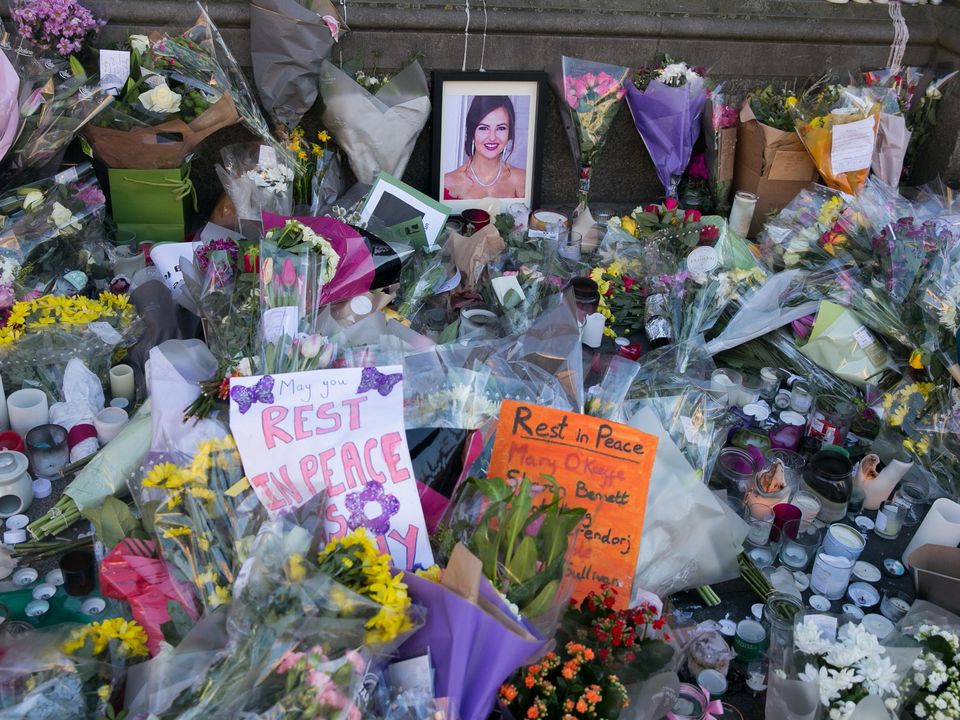 Flowers and messages placed outside Leinster House, Dublin, in memory of murder victim Ashling Murphy. Photo: Gareth Chaney/Collins