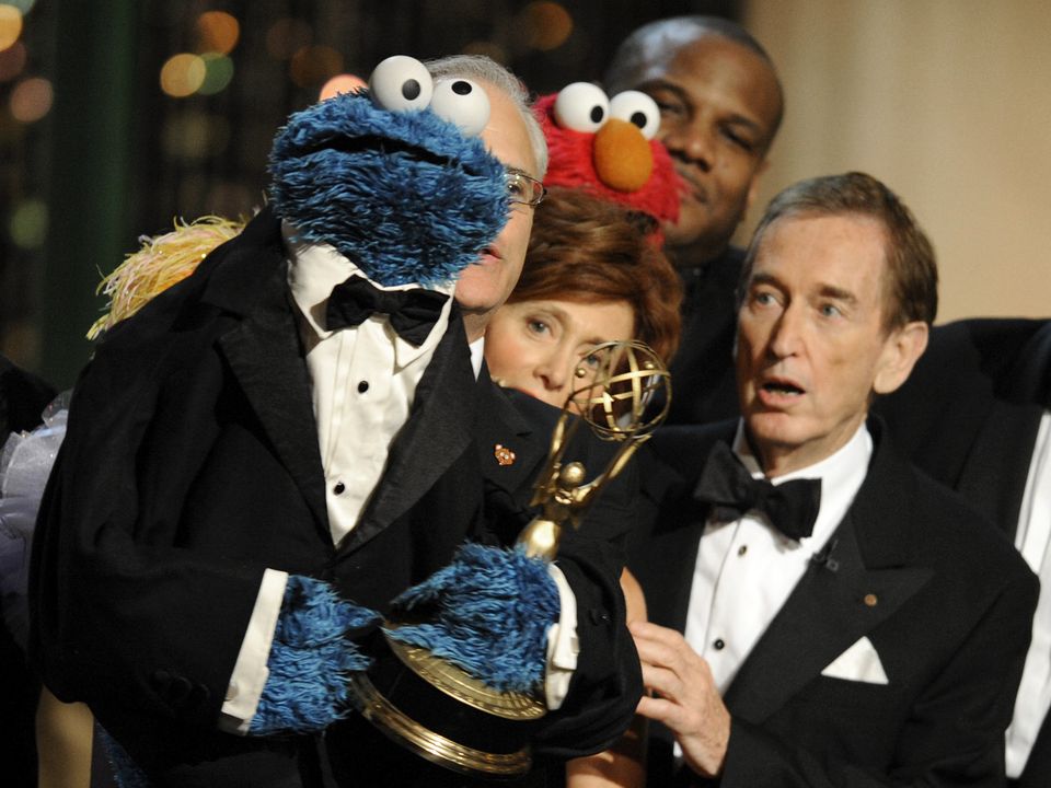 FILE - Bob McGrath, right, looks at the Cookie Monster as they accept the Lifetime Achievement Award for '"Sesame Street" at the Daytime Emmy Awards on Aug. 30, 2009, in Los Angeles. McGrath, an actor, musician and childrenâ€™s author widely known for his portrayal of one of the first regular characters on the childrenâ€™s show â€œSesame Streetâ€ has died at the age of 90. McGrathâ€™s passing was confirmed by his family who posted on his Facebook page on Sunday, Dec. 4, 2022. (AP Photo/Chris Pizzello, File)