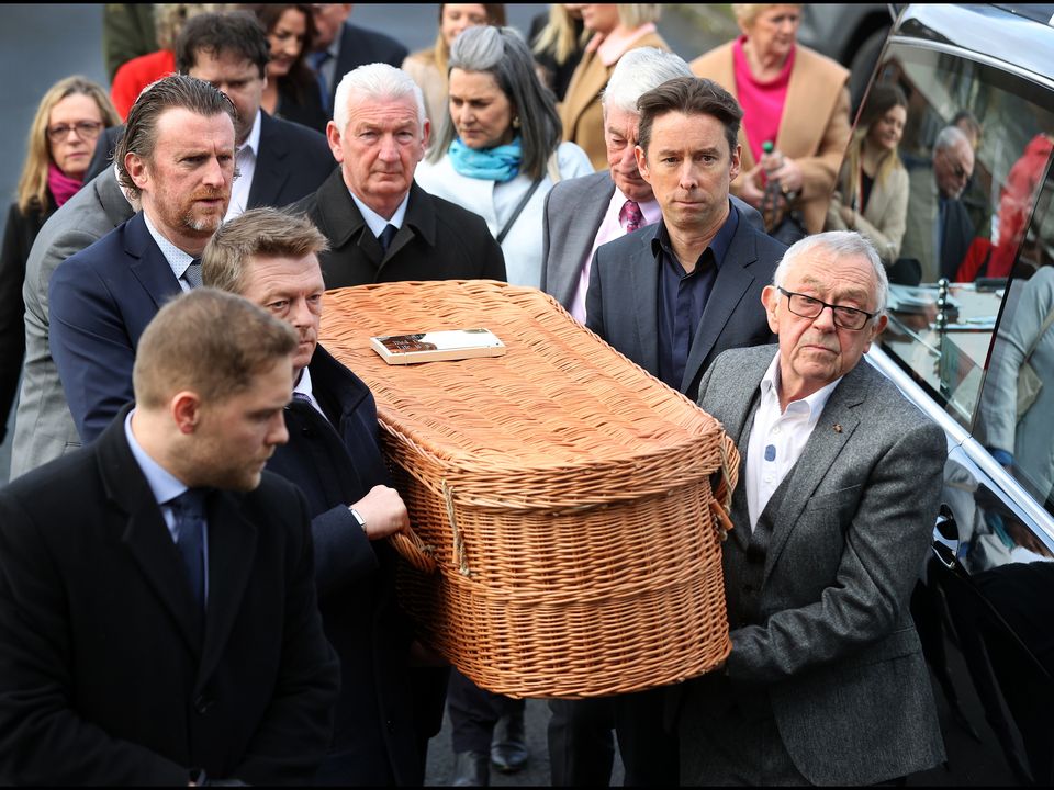 The remains of Deirdre Purcell are carried in to Our Lady of Victories Church in Ballymun by her family.
Photo by Steve Humphreys
16th Feb ruary 2023.
