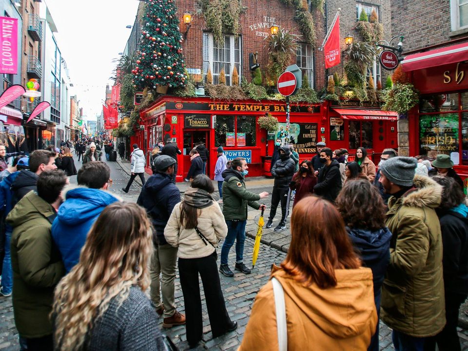 Tourists outside The Temple Bar pub in Dublin. Picture: PA