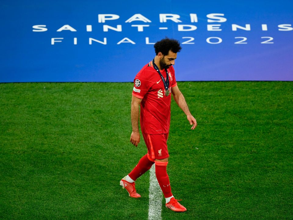 Mohamed Salah of Liverpool looks dejected following their sides defeat after the UEFA Champions League final match between Liverpool FC and Real Madrid at Stade de France on May 28, 2022 in Paris, France. (Photo by Matthias Hangst/Getty Images)