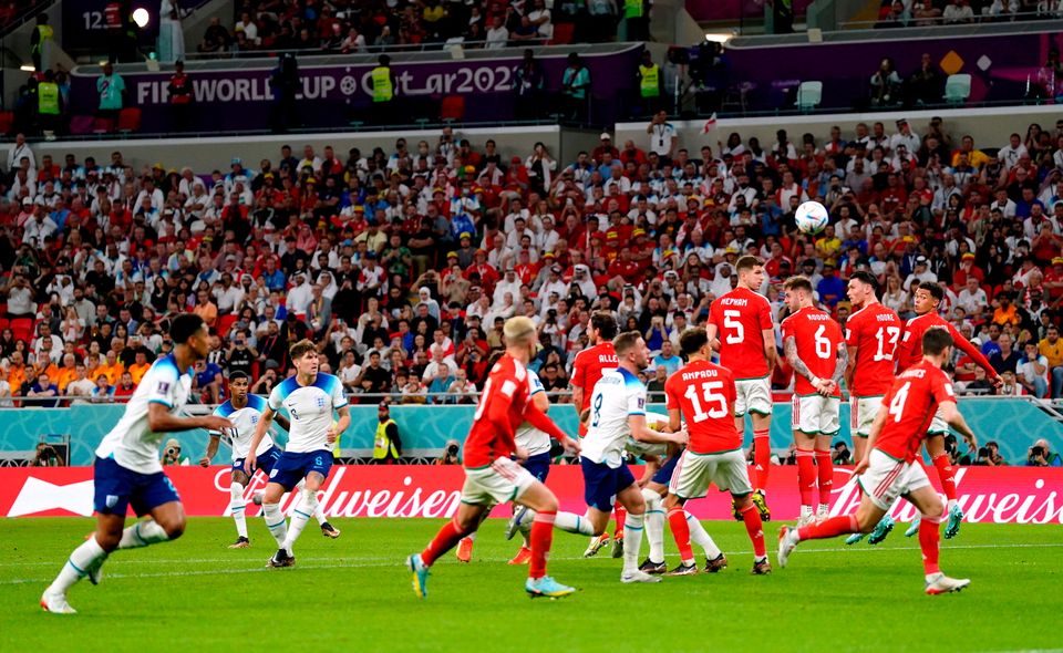 England's Marcus Rashford (far left) scores the opening goal of the game