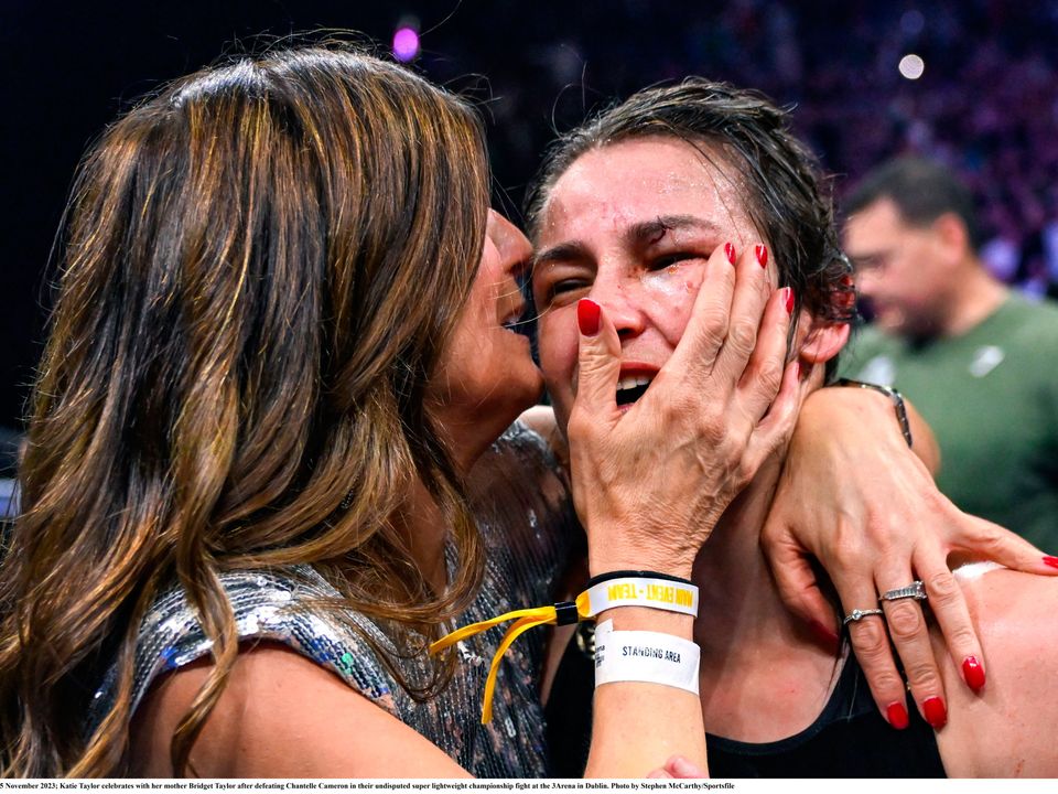 Katie Taylor celebrates with her mother Bridget Taylor after defeating Chantelle Cameron in their undisputed super lightweight championship fight at the 3Arena in Dublin. Photo by Stephen McCarthy/Sportsfile