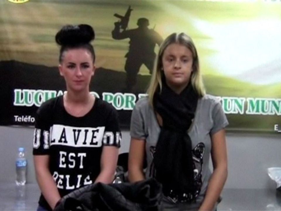 Michaella McCollum (left) and Scottish national Melissa Reid following their arrest by police in Lima, Peru, in August 2013.