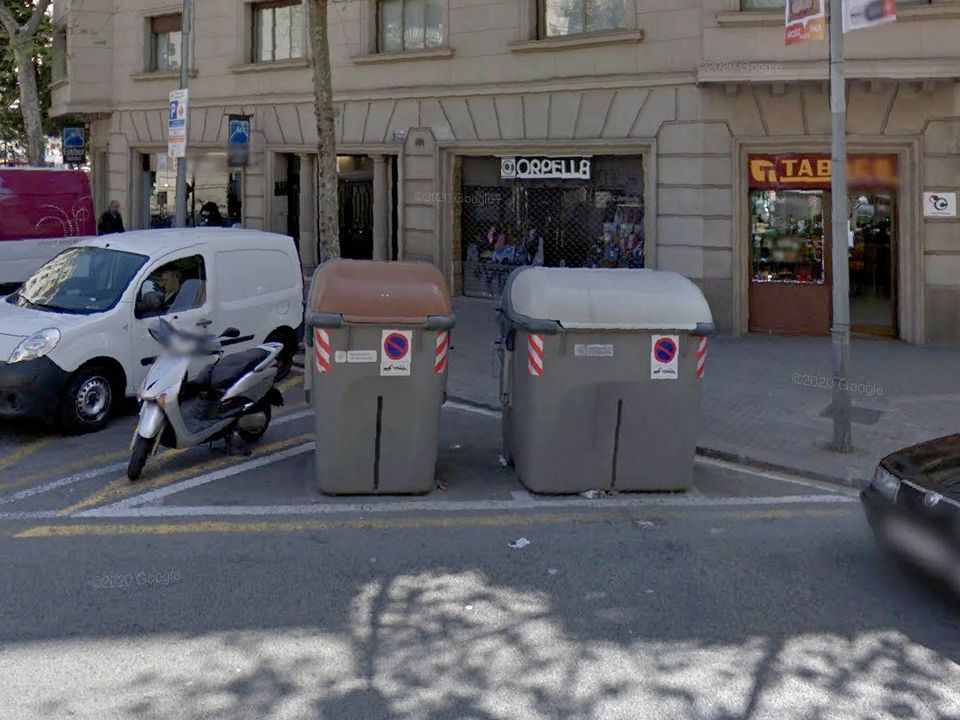 Pictured: Rubbish bins on the street in where the torso was found (Pic credit: Solarpix)