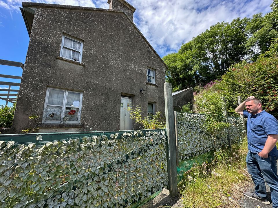 Our reporter Alan Sherry at a house near the church