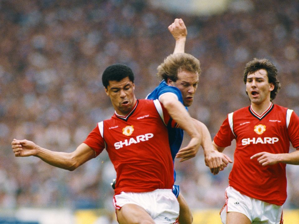 LONDON, UNITED KINGDOM - MAY 18:  Everton striker Andy Gray (c) is challenged by Paul McGrath (l) as Bryan Robson looks on during the 1985 FA Cup Final between Everton and Manchester United at Wembley Stadium on May 18, 1985 in London, England. (Photo by David Cannon/Allsport/Getty Images)