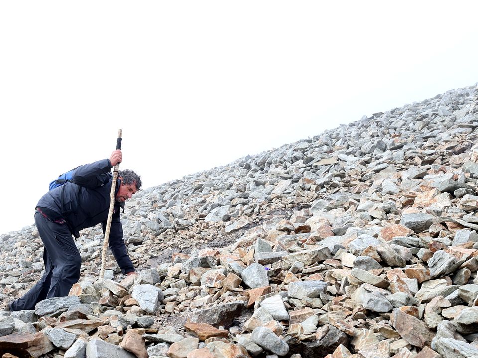Charlie Bird makes his way to the top of Croagh Patrick. Photo by Gerry Mooney